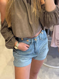 Denim short met goude knopen - Lichtblauw